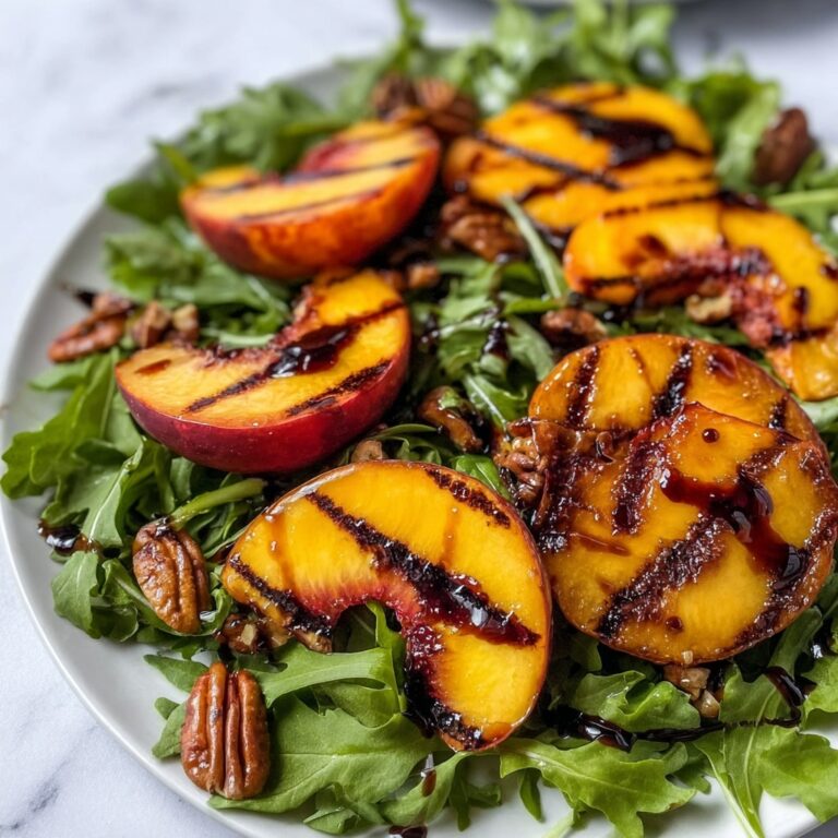 Grilled Peach Salad with Candied Curry Pecans and Honey Vinaigrette Recipe
